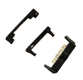 1.27 mm × 1.27 mm pitch IDC receptacle connector with three-piece plastic housing construction